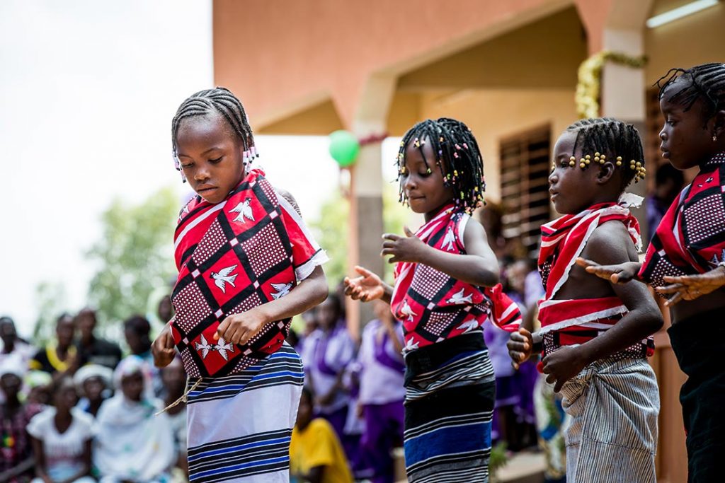 Children in Burkina Faso perform a special Christmas dance.